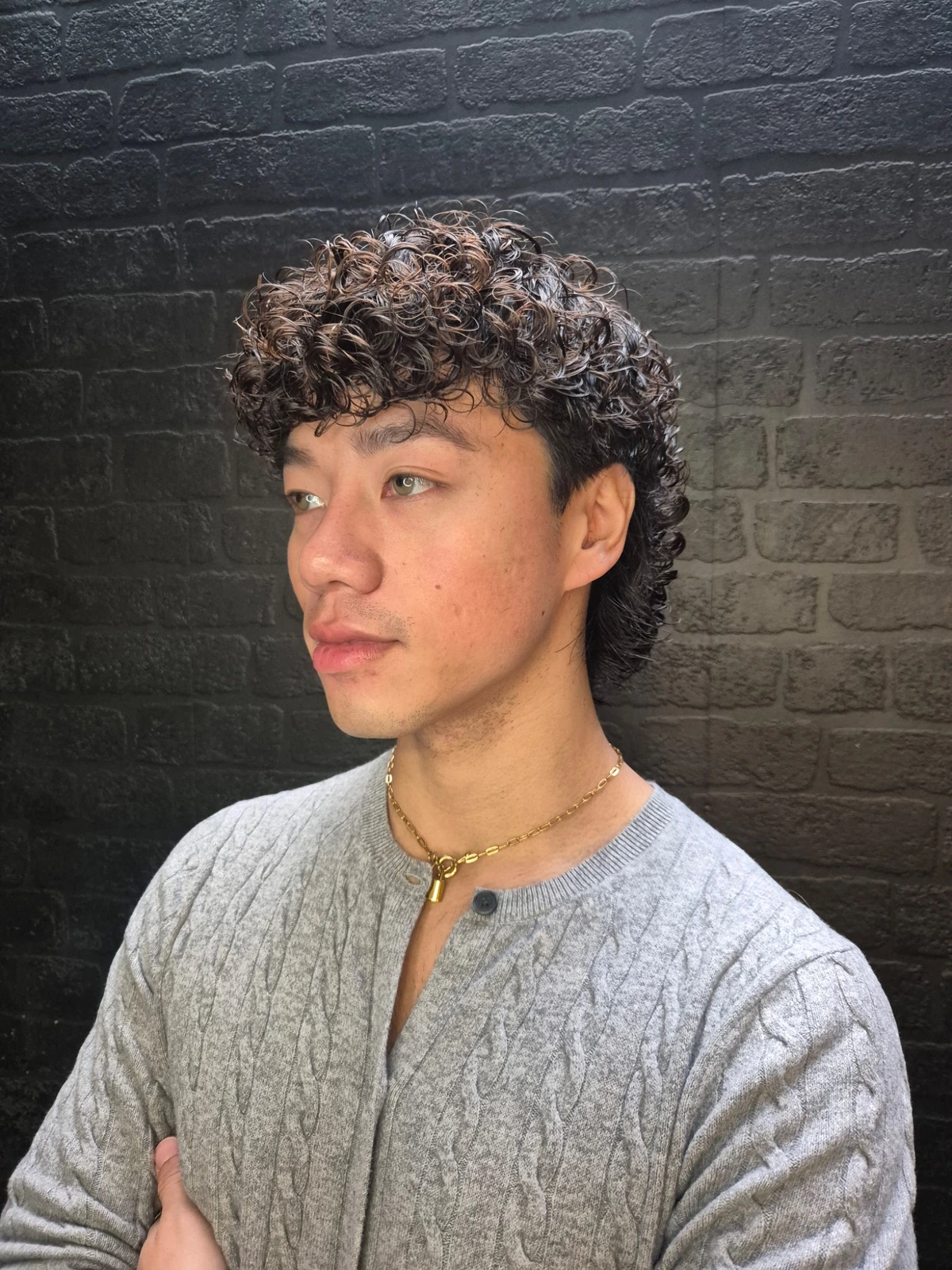 Men's haircut with defined curls after an organic perm at Oliver Stephens