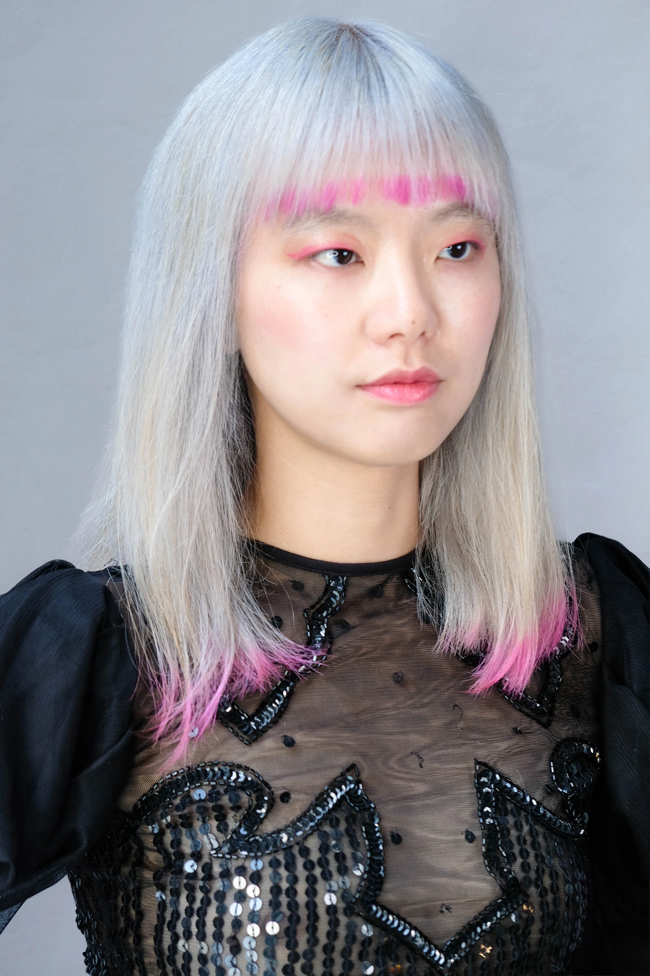Silver hair with vivid pink fringe and pink detailing