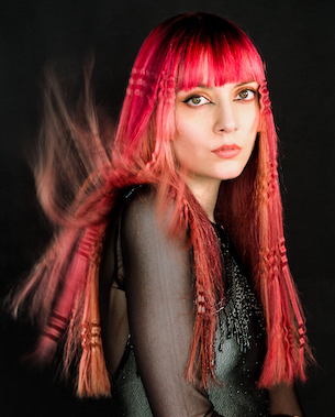 model with long hair dyed red, 1 of 3