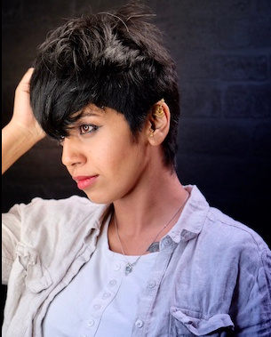 model with short hair, cut around ear with fringe