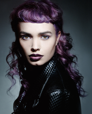 another pic of model with purple hair and leather jacket